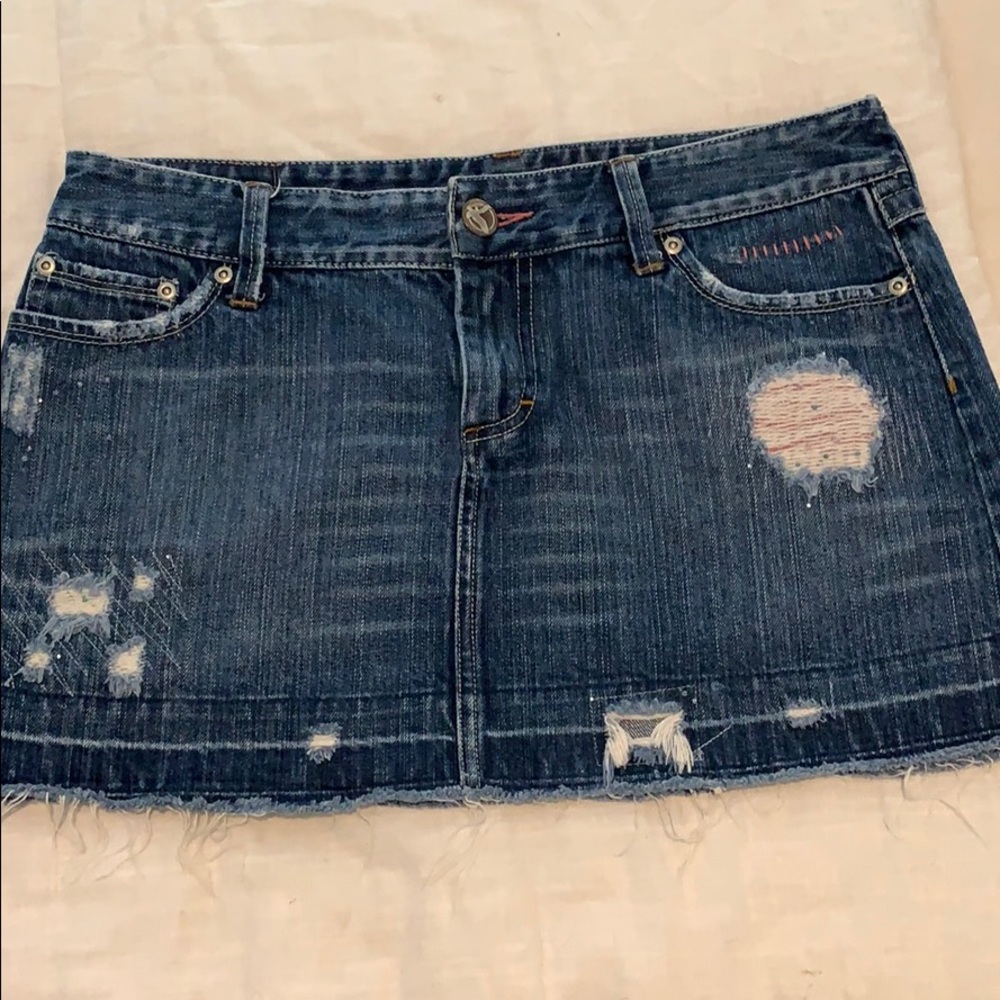 Distressed, bejeweled, jean skirt.